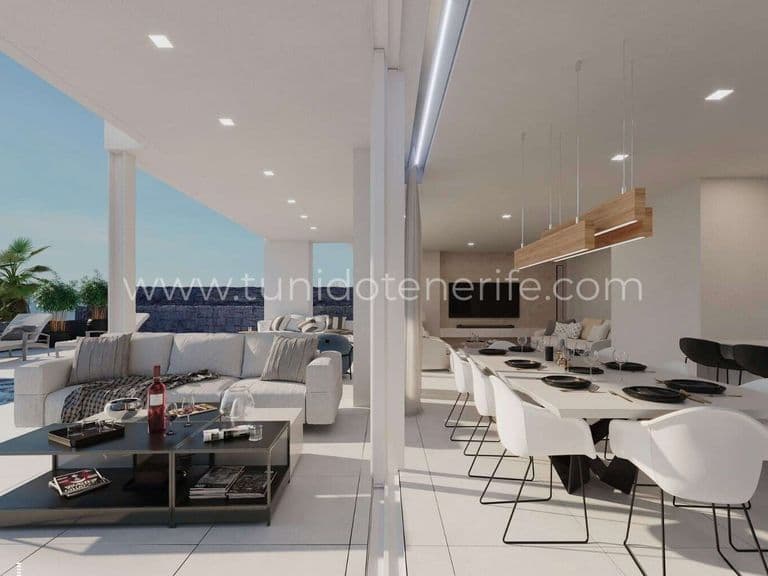 Modern living room and dining area with terrace access