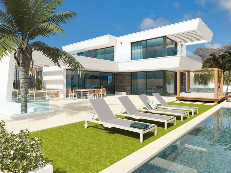 Outdoor pool with loungers and palm tree beside a modern house
