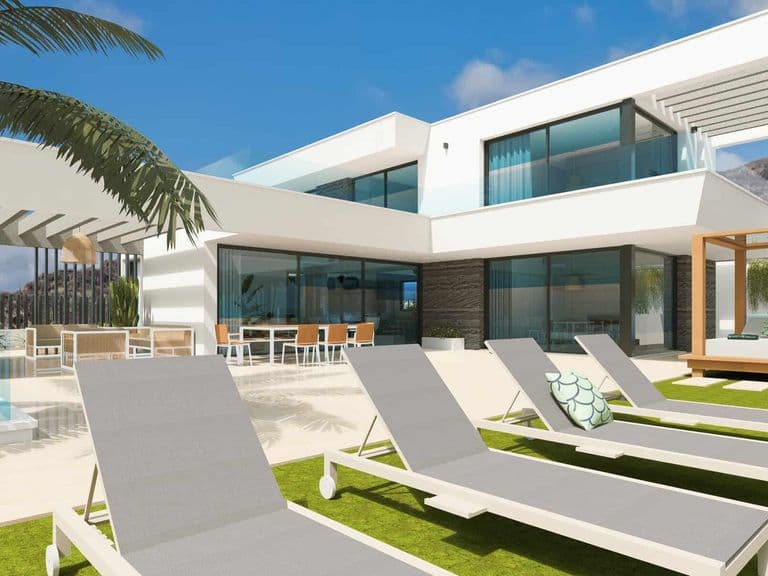 Outdoor terrace with sun loungers, pool and al fresco dining area