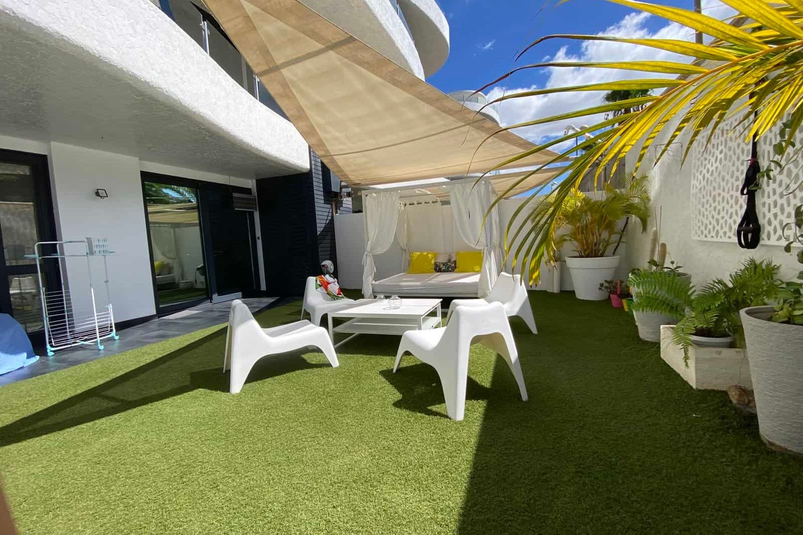 Garden terrace with seating area and pergola