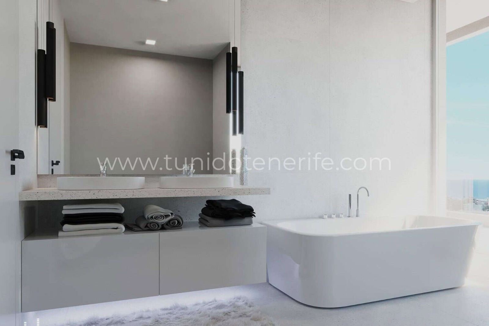 Modern bathroom with double sink and freestanding bathtub