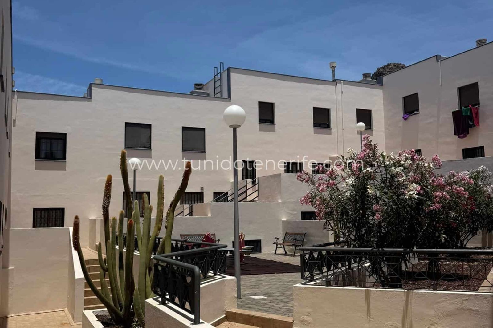 Casa adosada en Fañabe Pueblo con patio comunitario