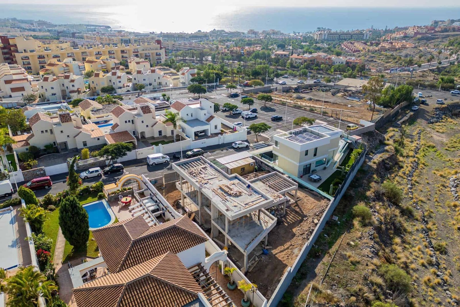 Aerial view of houses, streets and landscaped area