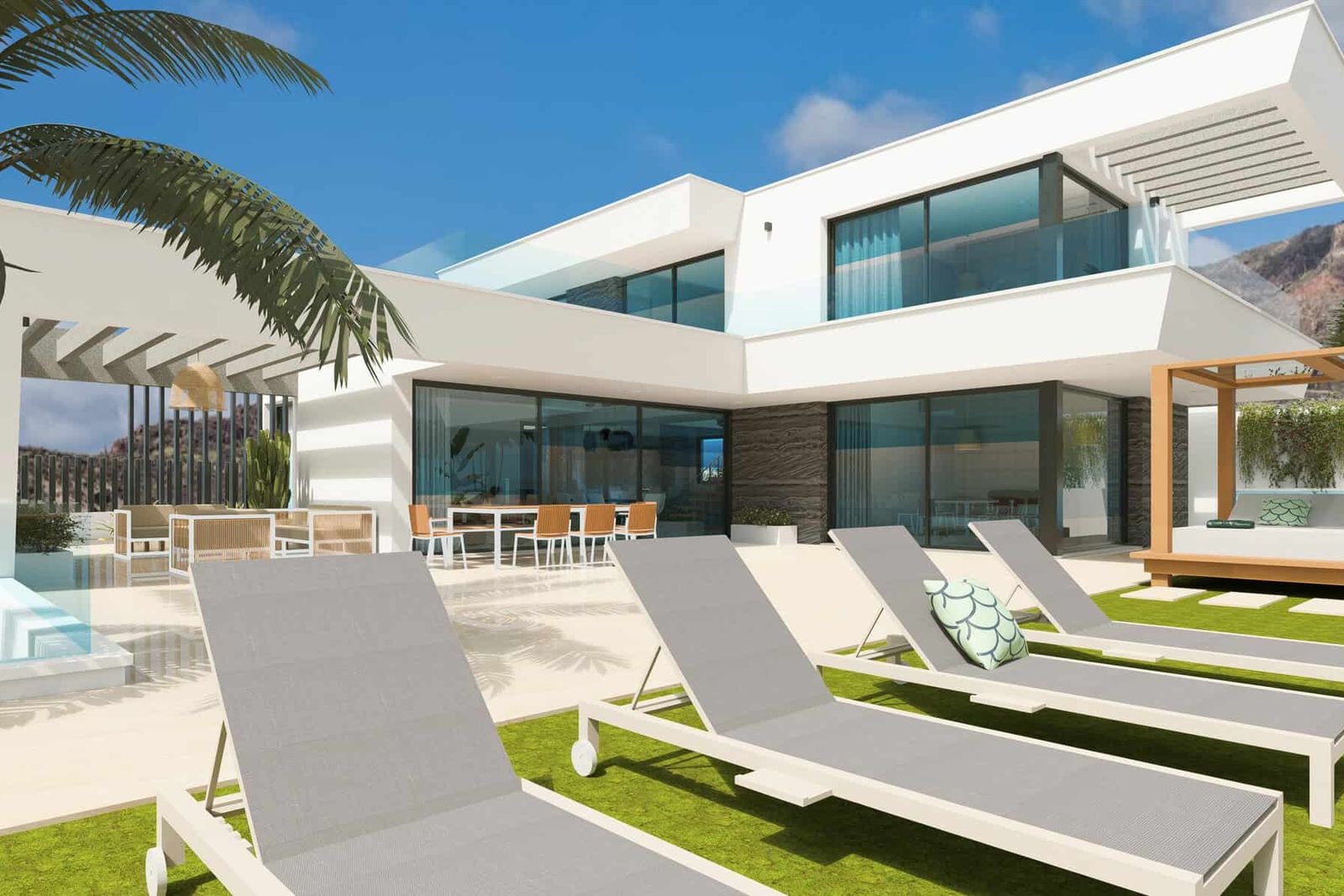 Outdoor terrace with sun loungers, pool and al fresco dining area